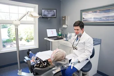 Dr. Nguyen working with a new patient at Conyers Family Dentist